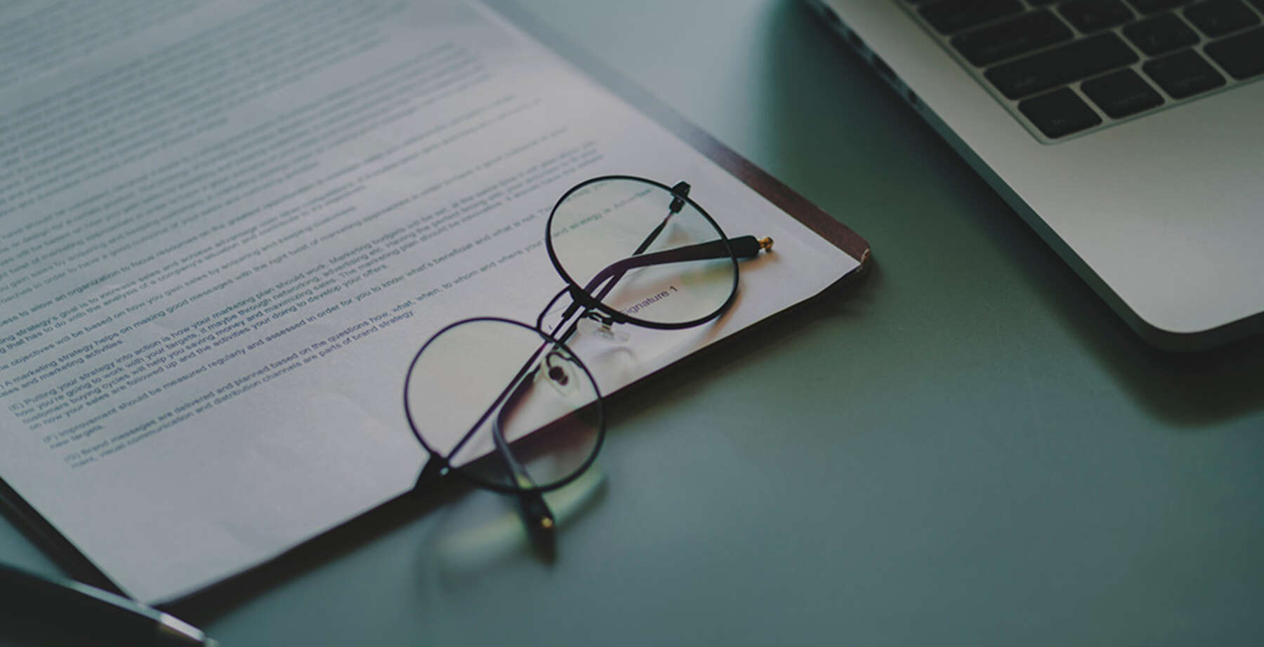 Photo of glasses on a paper