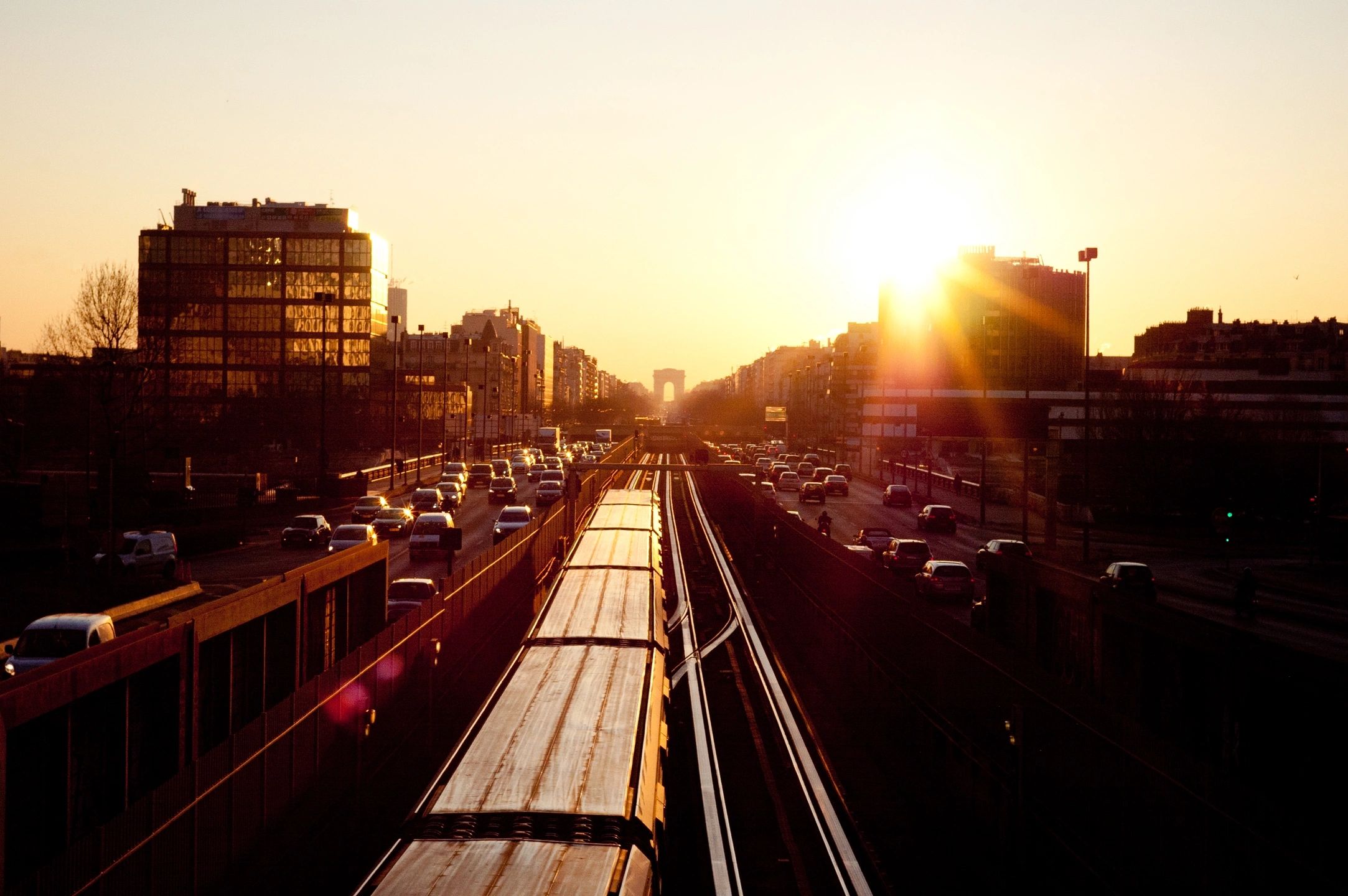 photo of train at sunset